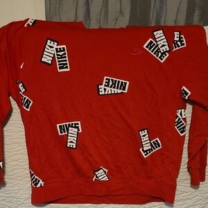 Nike Red Sweatshirt with Bold Logo Pattern